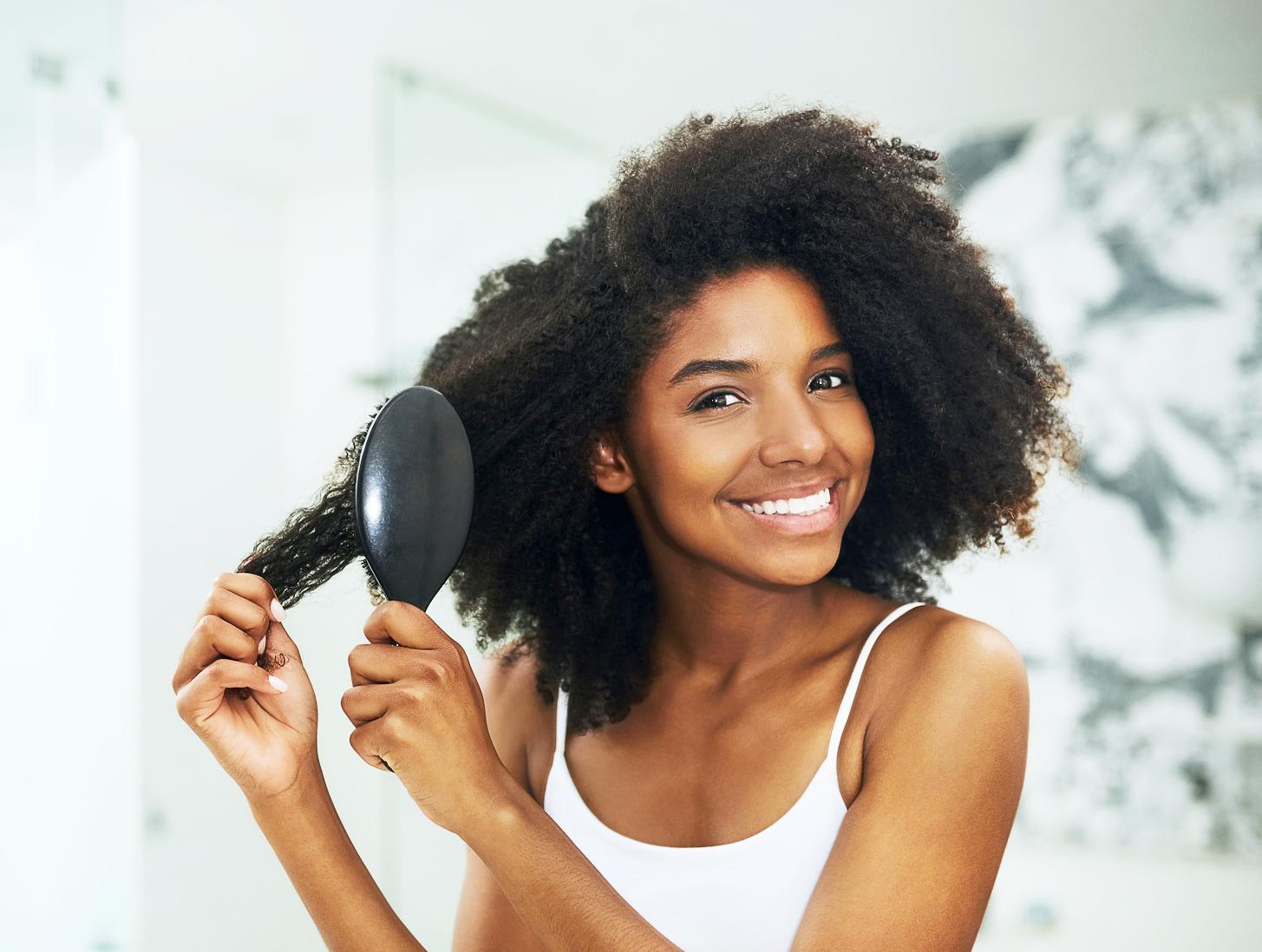 woman brushing hair